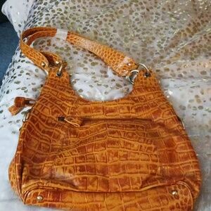 Cognac colored genuine Italian leather handbag. Croco embossed
